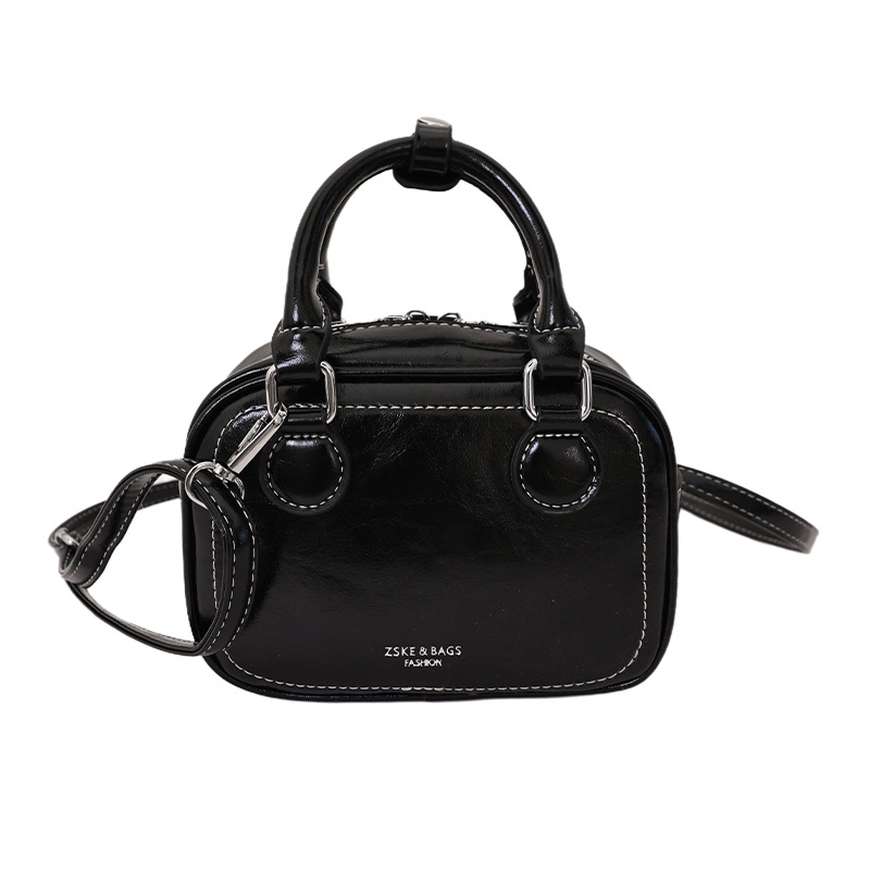 Bolsa de bolos portátil de alto nivel para mujeres 2026 nueva moda coreana lujosa y ligera bolsa de hombro