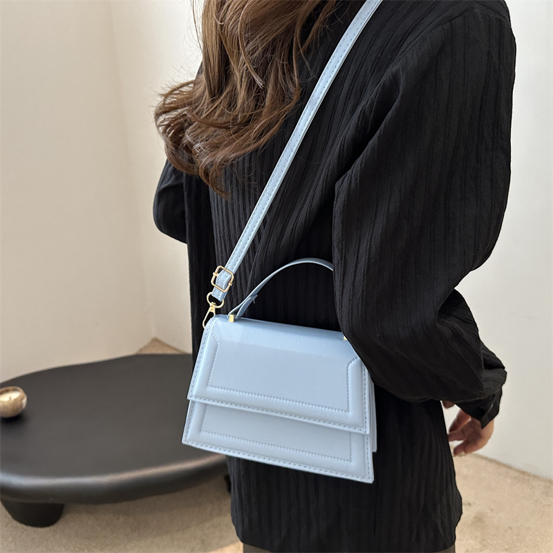 Calle casualidad de color sólido bolso de hombro 2024 nuevo tipo de bolso de mano casualidad nueva moda simple bolso de hombro