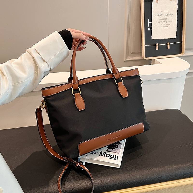 2024 transfronterizo nuevo nylon bolso de mano casual gran capacidad de color retro viaje mochila de hombro