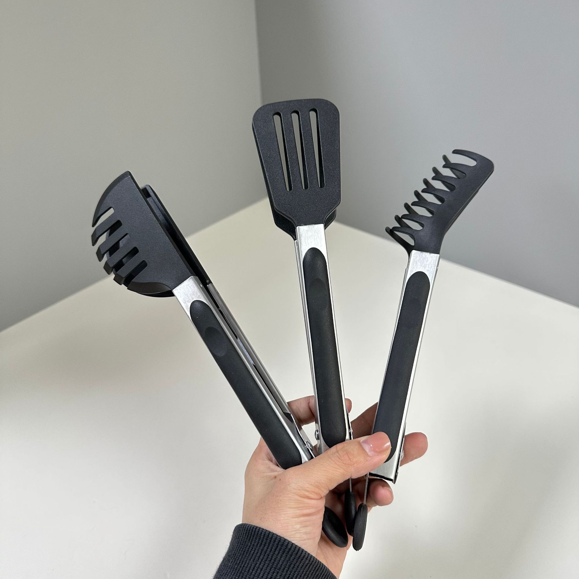 Spaghettitang i rustfrit stål med silikone til buffet_voghion.com