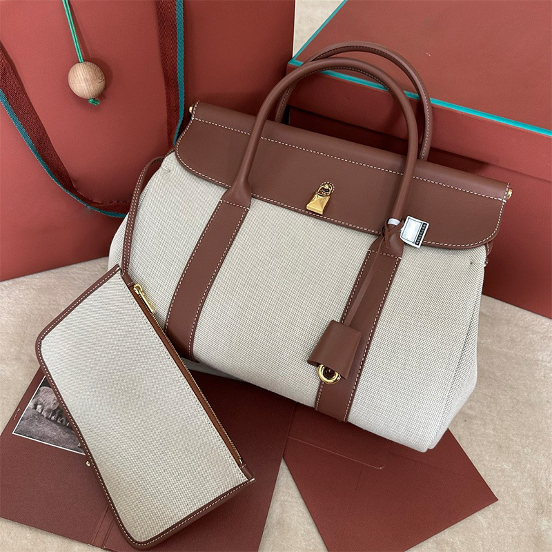 Lp32 High-Quality Cowhide Leather Handbag Tote Bag 2026 New Fashion Versatile Light Luxury Niche Shoulder Crossbody Women's Bag Lp32 High-Quality Cowhide Leather Handbag Tote Bag 2026 New Fashion Versatile Light Luxury Niche Shoulder Crossbody Women's Bag