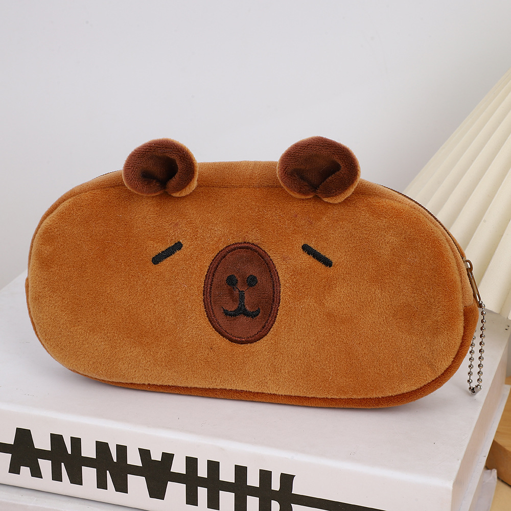 Bolso de lápices de felpa Kapibala de estilo explosivo Bolso de papelería para niños de carpincho de dibujos animados de gran capacidad Bolso de almacenamiento de suministros escolares