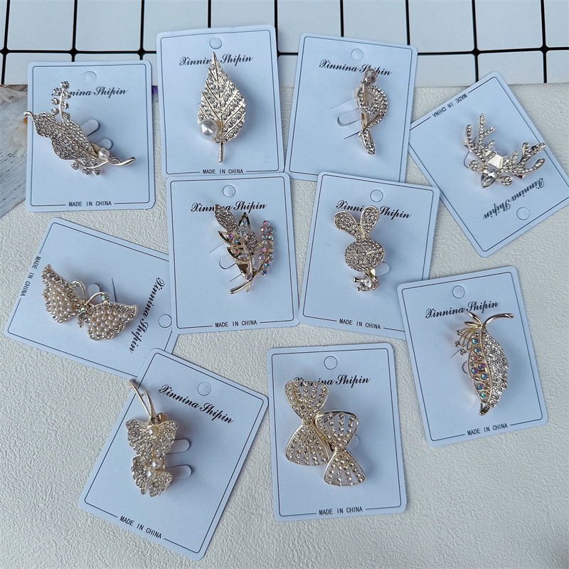 Cross-border new brooch alloy diamond corsage pin headscarf flower anti-exposure pin buckle 2 yuan shop jewelry wholesale