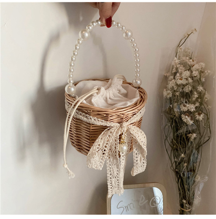 Fashion Round Straw Pearl Portable Bag display picture 13