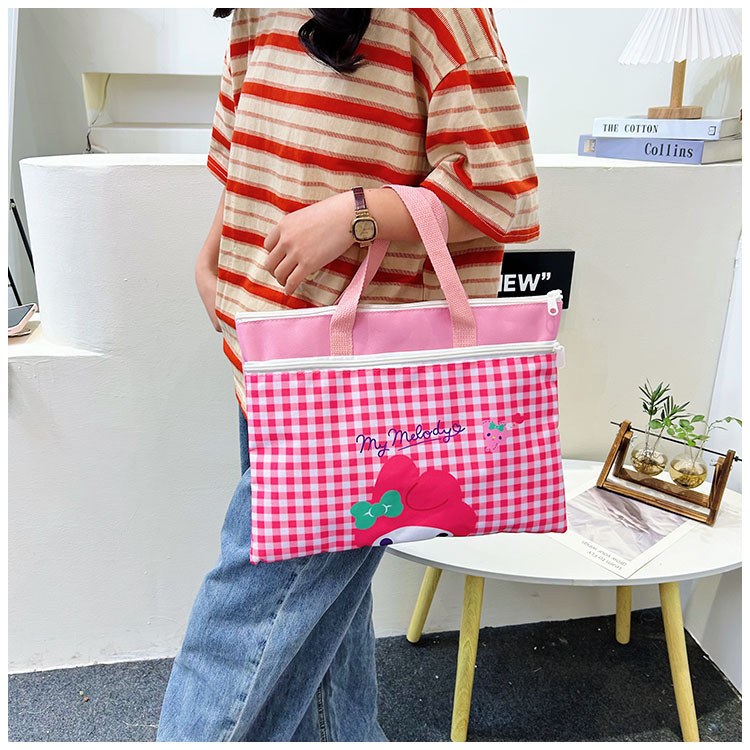 The new Spring 2024 Stardelo minimalist cartoon large-capacity student handbag, study materials and tutorial bag details Picture