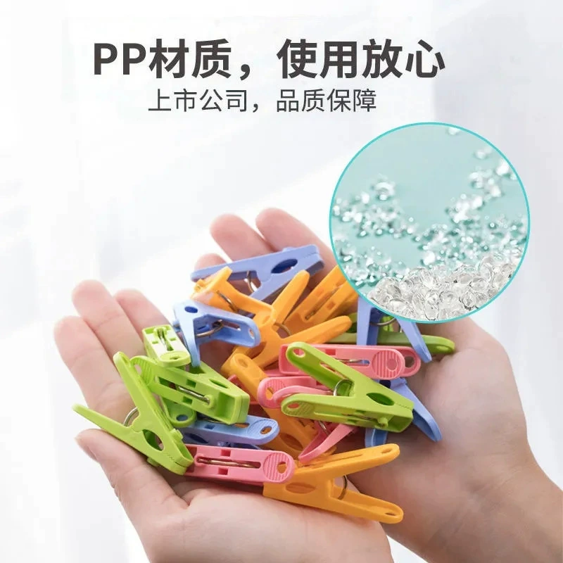 Windproof clothes hanger and clothespins 22101K mesh bag with 20 clothes drying clothespins plastic windproof clothespins