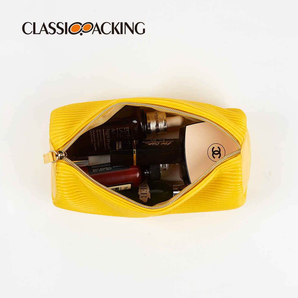 Bolsa de almacenamiento al por mayor de primavera 2025 Bolsa de almacenamiento de herramientas de belleza fresca pequeña japonesa Bolsa de cosméticos con diseño de Pu plisado