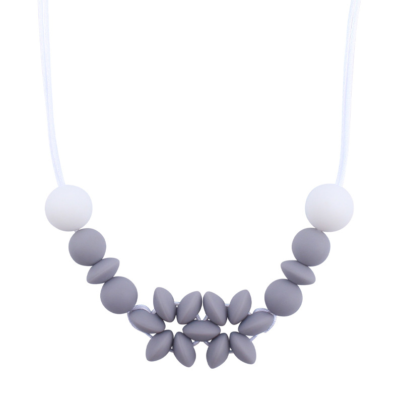 Suministros de bebé collar de flores de dibujos animados bebé creativo cuentas de silicona mordedura molar COLLAR COLGANTE hecho a mano