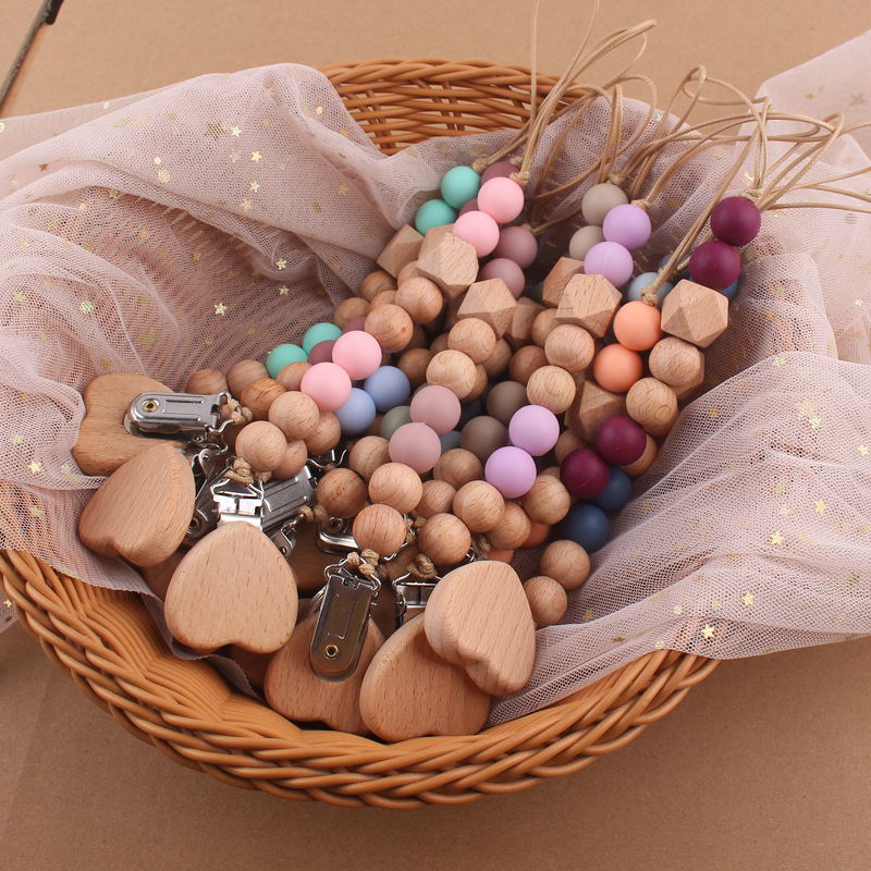 Nuevos suministros para bebés de dibujos animados amor haya chupete clip creativo bebé cuentas de silicona mordedura molar chupete cadena