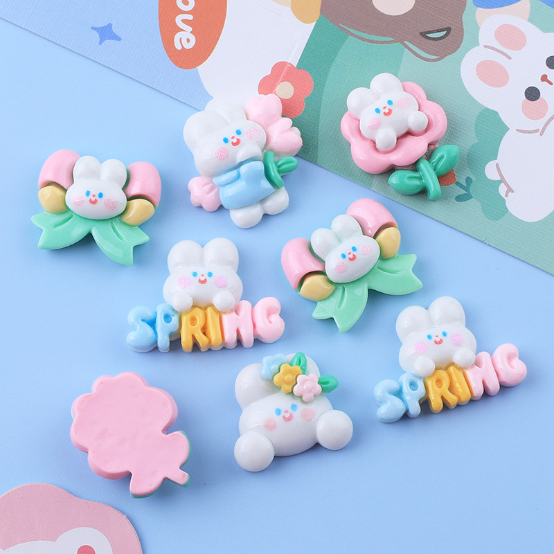 Brillante conejo blanco resina accesorios DIY crema pegamento sosteniendo flor conejo parche taza de agua pegatinas cuerda de pelo accesorios para el cabello banda de goma paquete de material