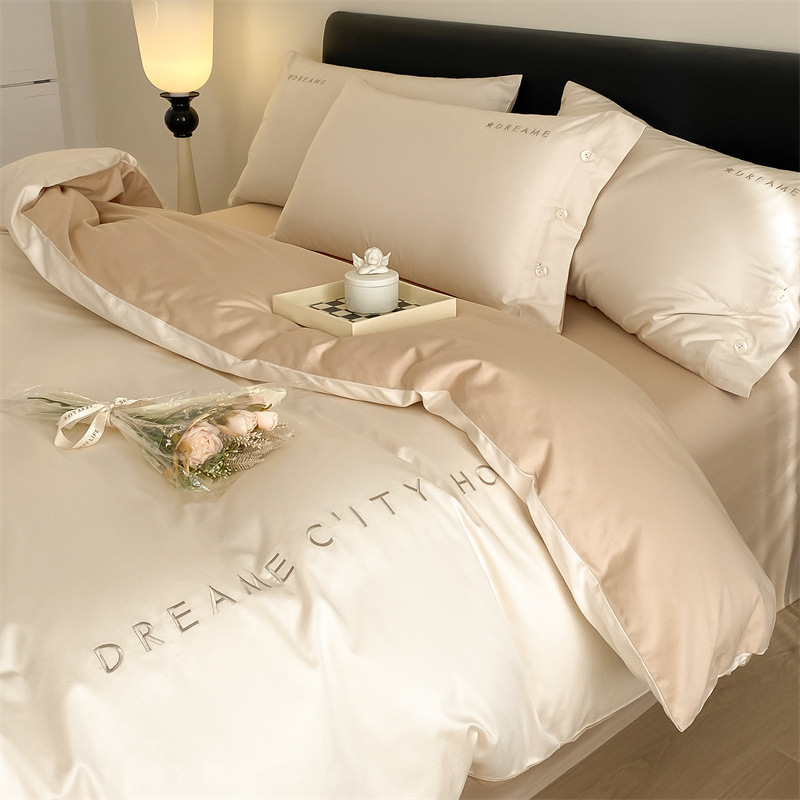 Cama de algodón cuatro piezas estudiantes tres piezas cubierta de edredón bordado de algodón sábanas caseras ropa de cama impresión y teñido activo