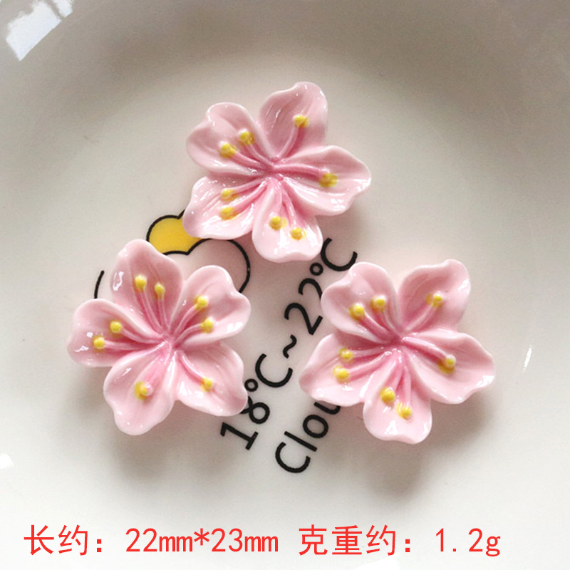 Nuevos accesorios de bricolaje de flor de durazno de resina rosa, zapatos con agujeros de pegamento de crema, fundas para teléfonos móviles, accesorios para el cabello, material de imán para refrigerador al por mayor