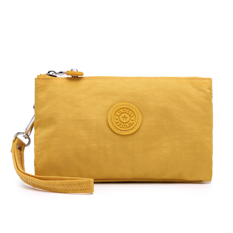 Bolsa de mano de nylon multicapa de gran capacidad a prueba de derrames de agua de mujer simple de moda larga cremallera cambio pasaporte bolso móvil