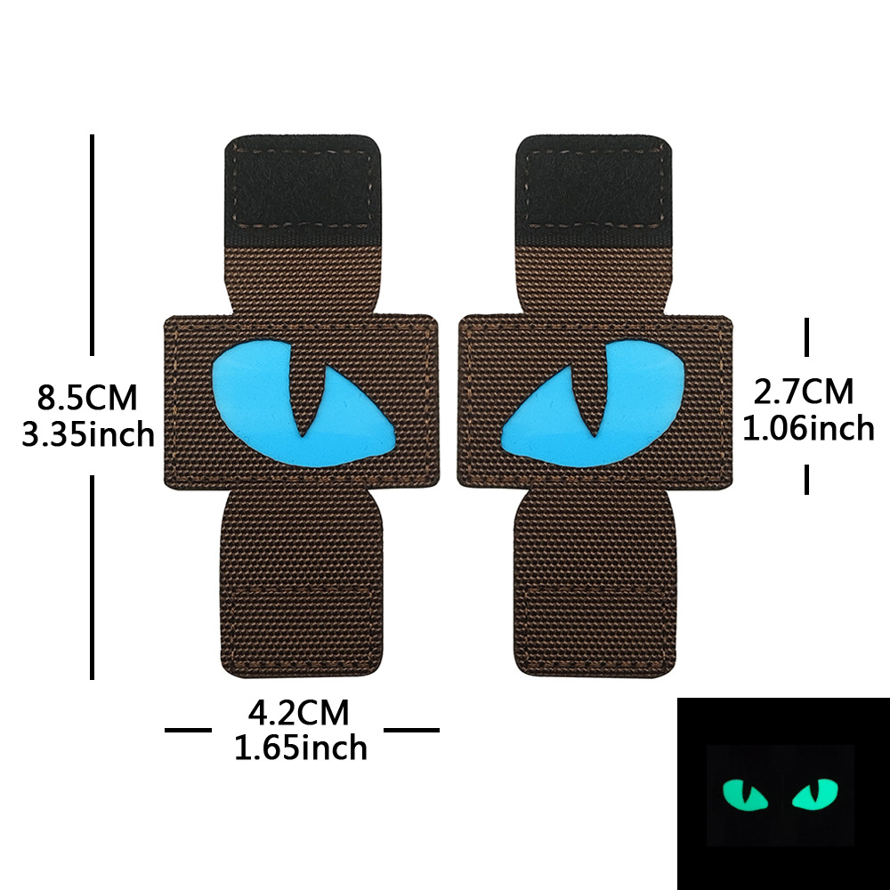 Creativo suministro personalizado gato ojo luminoso moral sello al aire libre militar fan mochila sello pequeño diablo militar MOLLE colgante
