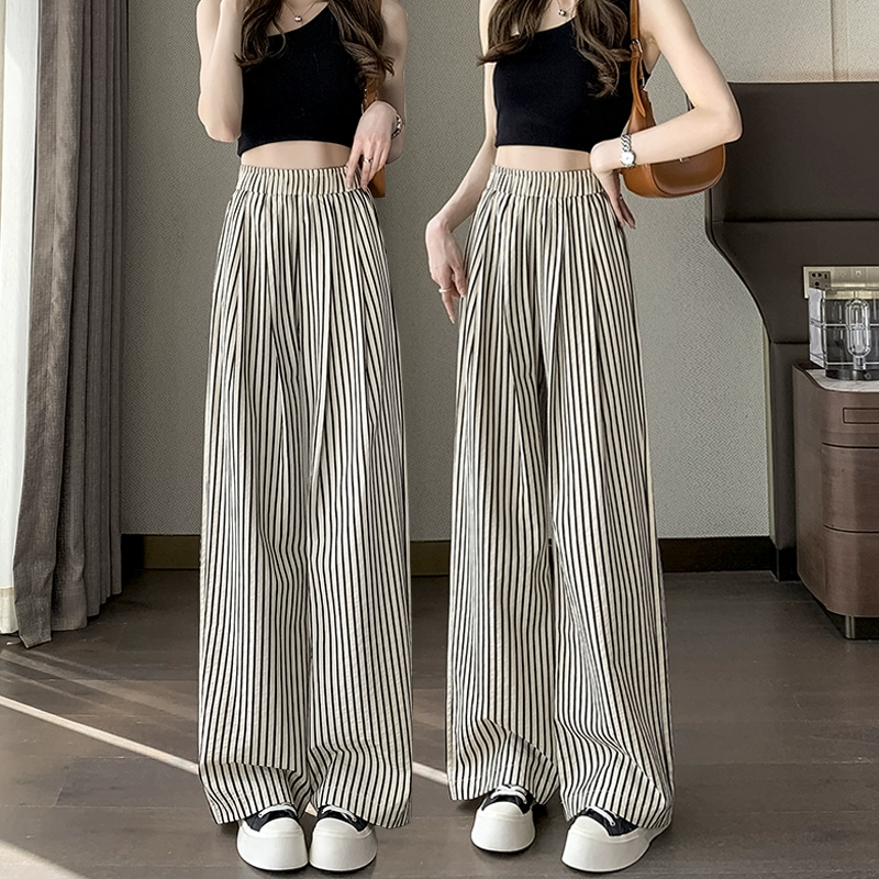Горястая полоска ледяной шелк повседневные широкие брюки женские летние 2025 новый стиль с высокой талией и подвеской свободные маленькие тонкие брюки