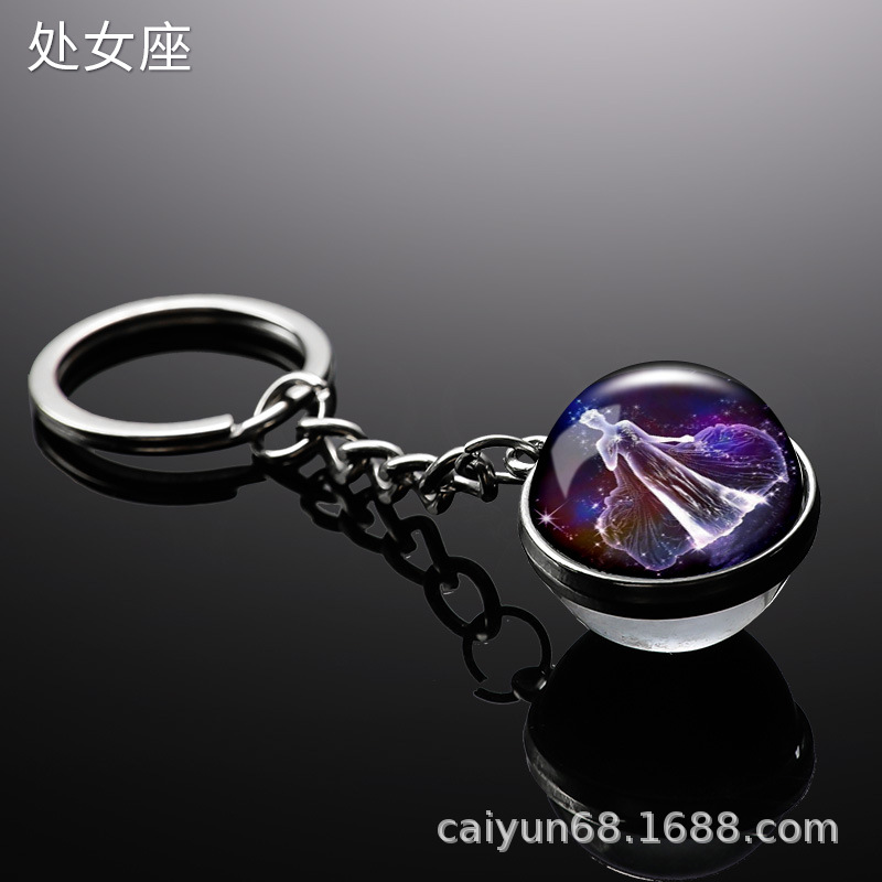 Transfronterizo 12 constelaciones de luz nocturna bolsos colgantes de bolsas de joyas de tiempo doble cara bola de vidrio llavero al por mayor