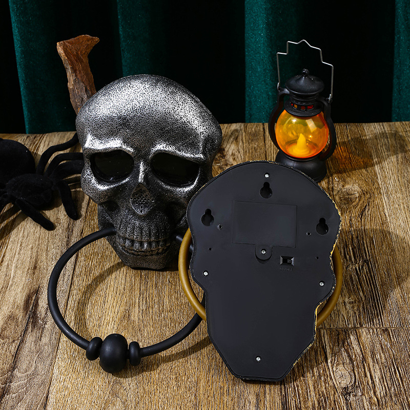 Make a bold statement this Halloween with the Halloween Skull Door Knocker. Crafted to catch attention, this striking decoration adds a spooky touch to your front door while serving as a functional knocker. Its detailed skull design creates an eerie atmosphere that sets the perfect mood for your Halloween festivities.