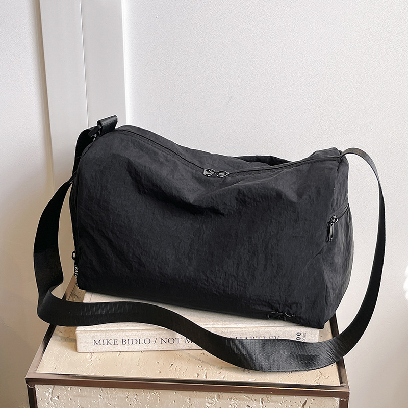 Moda coreana ligera simple ocio de gran capacidad de hombro mochila de caída de otoño nuevo estilo de alta sensación bolso de mano