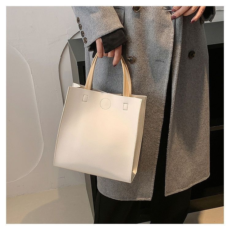 2024 New Bags Korean Version Versatile Commuting Bags Large Capacity Portable Tote Bag Temperament Popular Women’s Bag Vertical Style_voghion.com