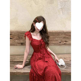 红色波点小飞袖吊带连衣裙子女装夏季2025新款爆款蝴蝶结露背长裙