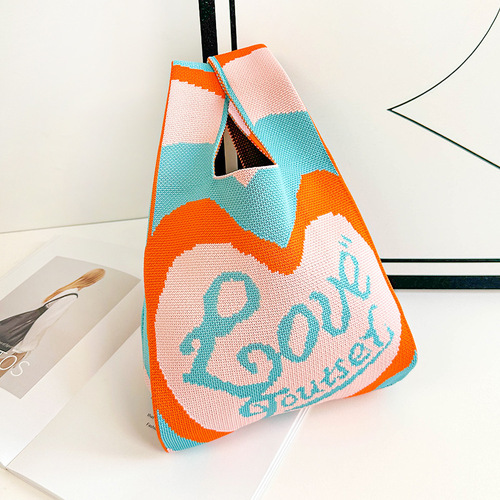 Knitted mobile phone bag for women dopamine color soft woven bag to wear Korean style ins contrast color love handbag wholesale