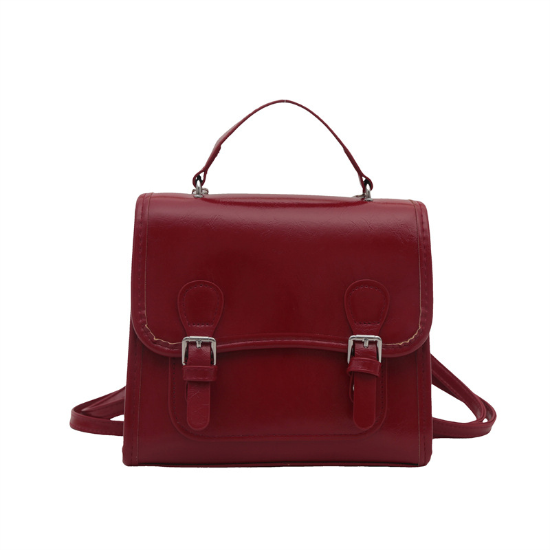 Bolso rojo de mano coreano para mujeres 2024 nueva moda mochila de moda estilo universitario mochila de hombro universal