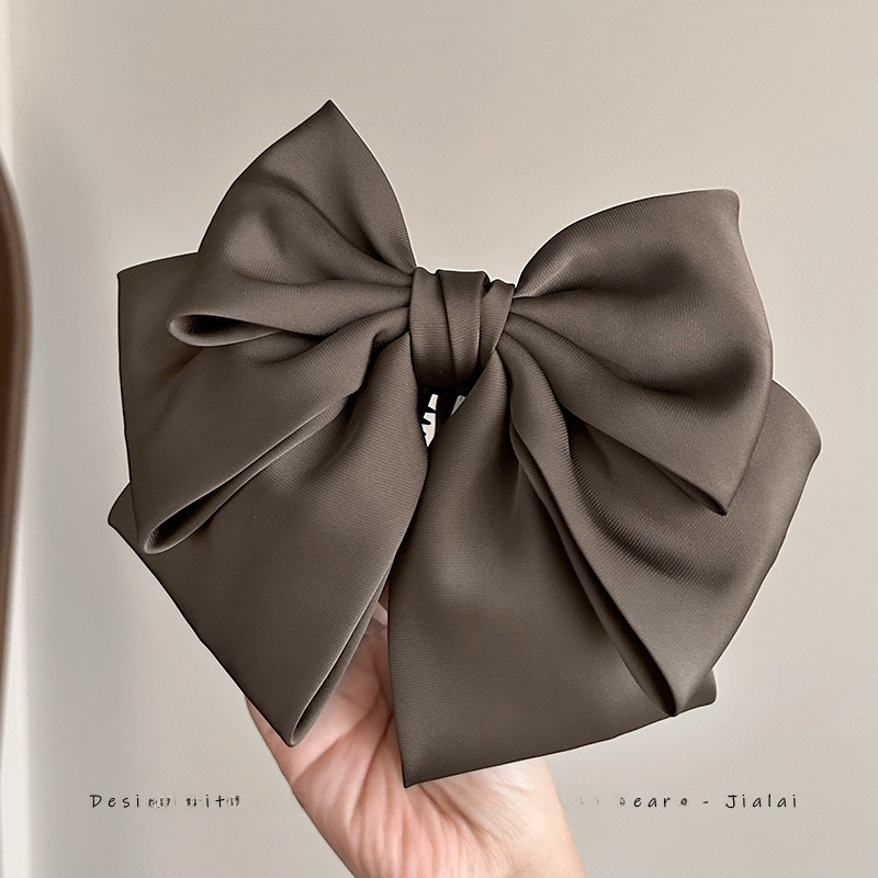 Fermaglio a banana con fiocco in raso elegante accessorio_voghion.com