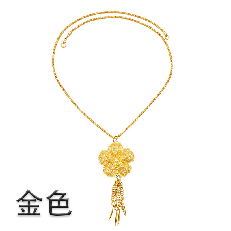 雲南タイ族のアクセサリーの民族風の金色のフリンジペンダントのアクセサリーの西双版納の金属は腰のチェーンにぶら下がっています。|undefined