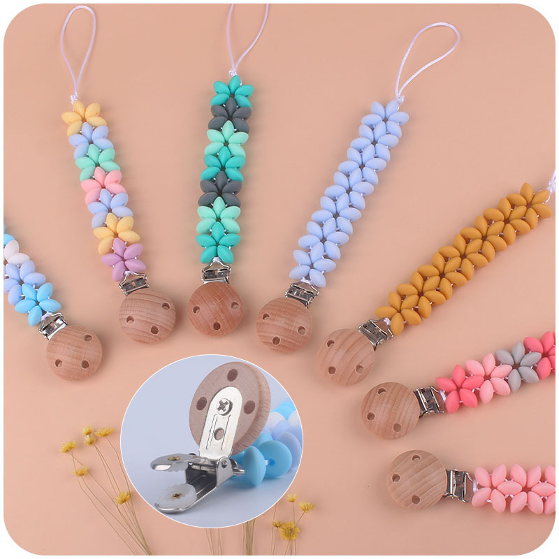 Nuevos suministros para bebés pétalo Cadena de chupete calmante bebé Arco Iris cuentas de silicona clip de chupete de haya Amazon