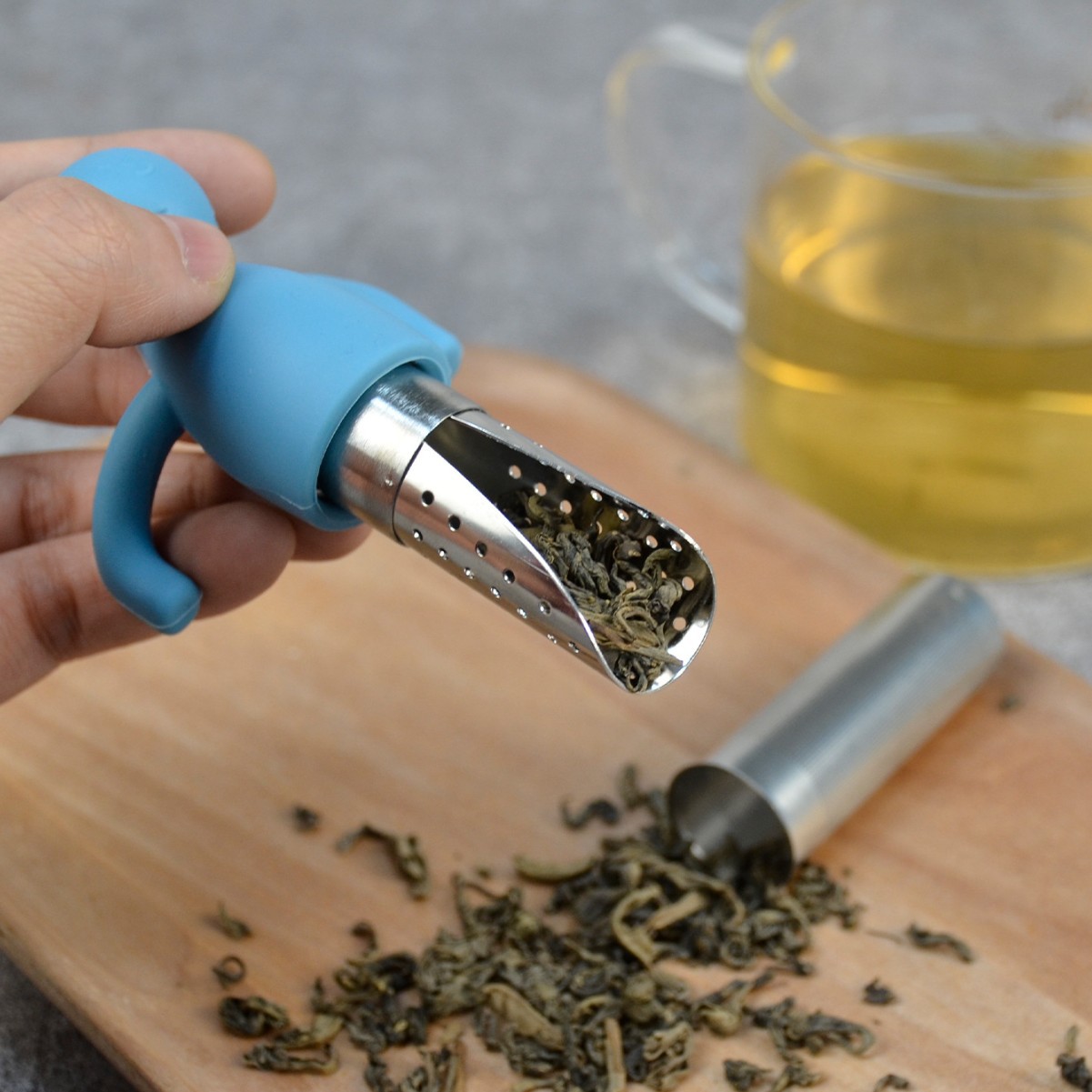 Colador de té creativo de acero inoxidable con cuchara de té colgando portátil de silicona en forma humana fabricante de té al por mayor lindo Filtro de té