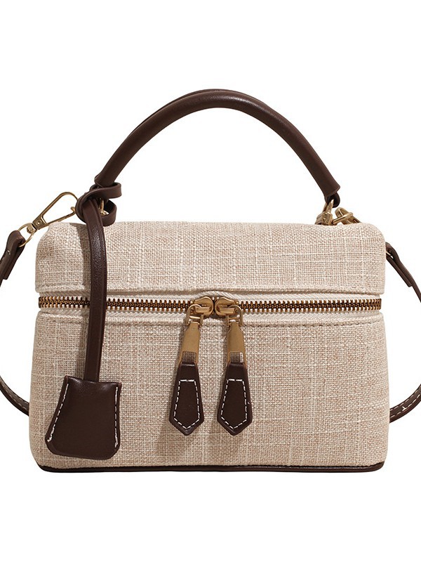 Bolso de mano de alta sensación para mujeres 2026 nuevo nicho zhong lino bolsa de almuerzo de viaje transfronterizo mochila pequeña bolsa
