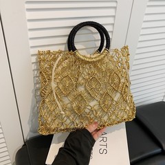 2025 夏超人気ハンドバッグ女性のメタリック中空織り海辺リゾートスタイルカジュアル多用途ハンドバッグ