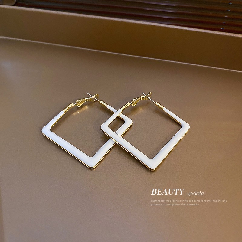 Aguja de plata flor pendientes geométricos pendientes dulces pequeños frescos de Corea del Sur ins moda nicho pendientes