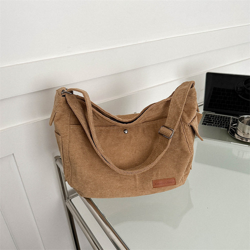 Large-capacity canvas casual bag  summer commuting texture make-up single shoulder crossbody bag this year's popular tote bag