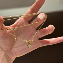 フランスの軽い豪華なダイヤモンドの四つ葉のネックレスの女性insの精緻な高級感のペンダントの大衆の個性の設計の鎖