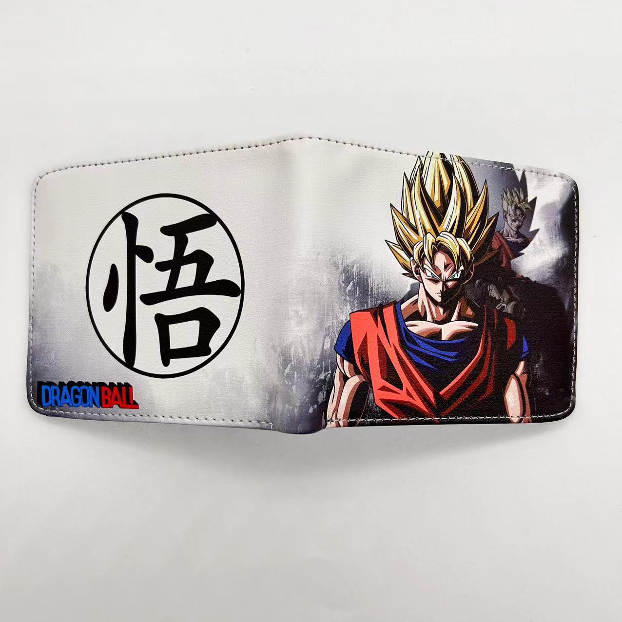 Anime Dragon Ball periférico dinero corto wukong Wu palabra estudiantes masculinos y femeninos corto monedero titular de la tarjeta en stock