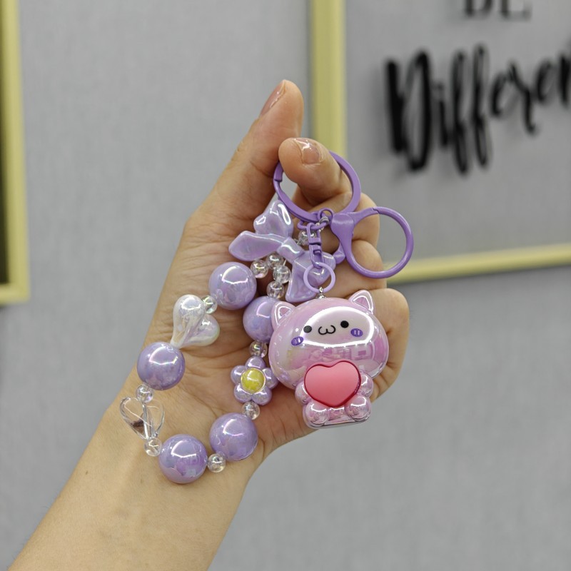 Galvanoplastia abrazo amor oso con cuentas llavero colgante acrílico muñeca colgante garra máquina muñeca regalo al por mayor