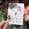 Cross necklace ears