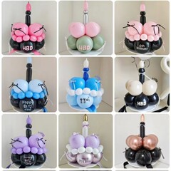 赤い本の同じ種類のケーキの風船の帽子の子供の誕生日の風船のパーティーは女子学生を飾って写真を撮る雰囲気の道具を撮影します。