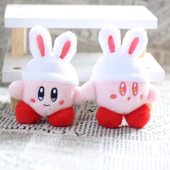 Cute and adorable plush toy figure of the rabbit-eared star character Kirby as a keychain, bag accessory, and hanging decoration.