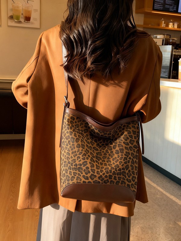 Bolso de gran capacidad de viento universitario para mujeres 2025 nuevo popular leopardo tote de alta calidad sensación de viaje de hombro mochila