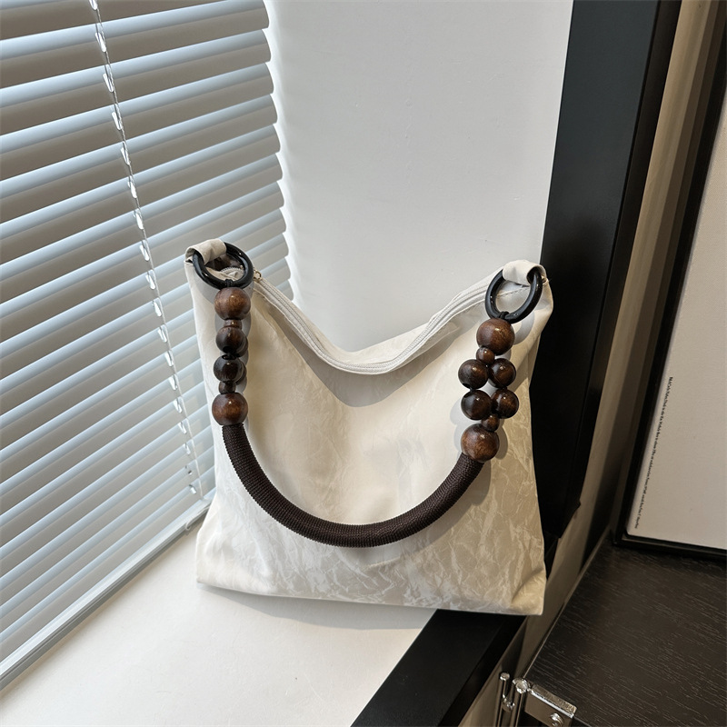 Nuevo estilo chino diseño de bolso de hombro mujer 2024 verano nuevo estilo de moda gran capacidad alta sensación de mochila