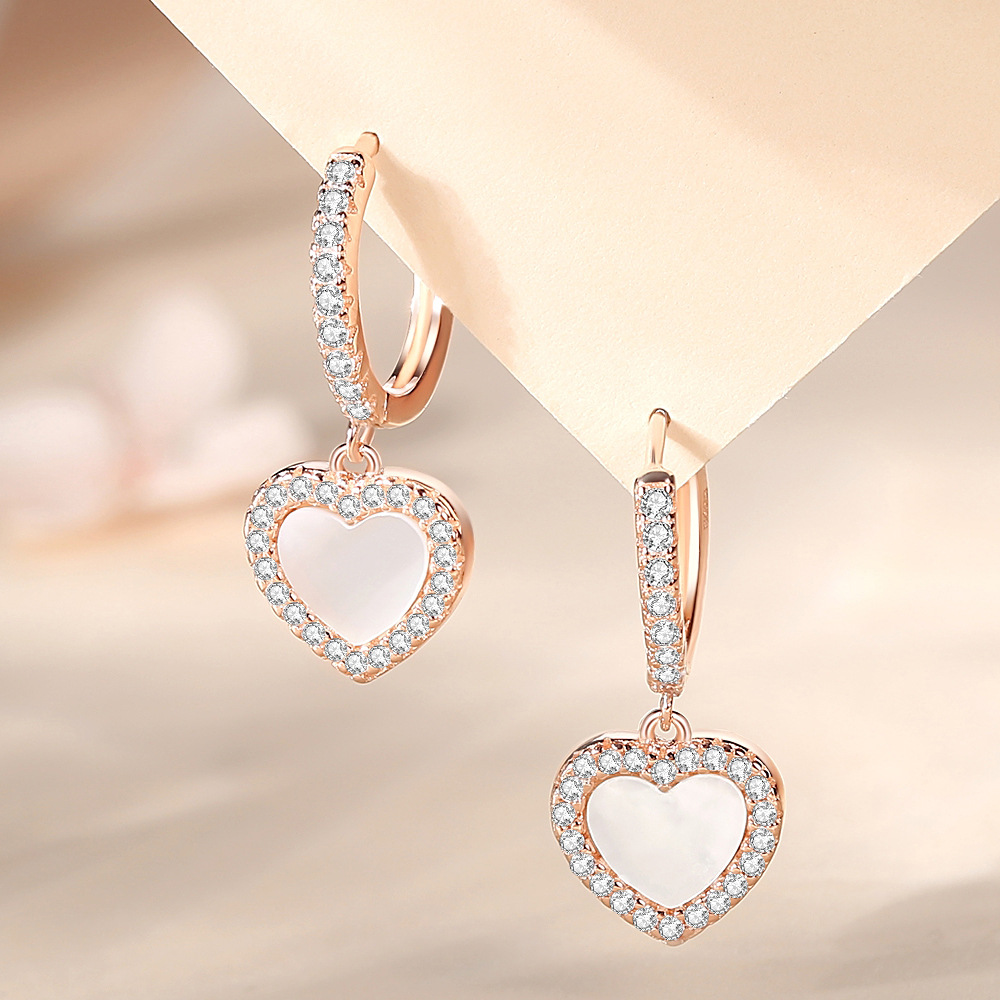 Pendientes de diamantes simples de plata de ley S925, diseño de nicho de alta gama, hermosos pendientes, colección de botones de oreja de estilo nuevo de verano