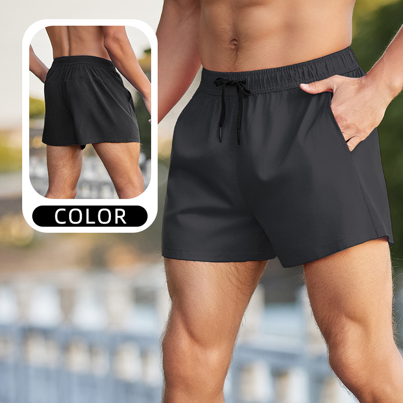 Pantalones cortos deportivos para correr anti-exposición de los hombres falsos de dos piezas de entrenamiento suelto al aire libre pantalones de fitness delgados pantalones cortos de secado rápido