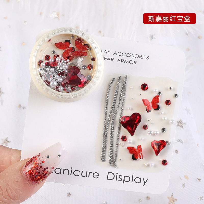 2023 nuevos accesorios de manicura camellia material paquete cadena de mariposa rosa arco mezcla combinación