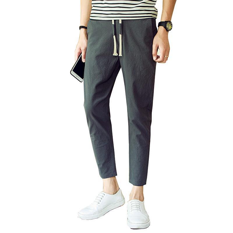 Pantalones cortos casuales pantalones de verano de 9 puntos para hombres, pies pequeños, pantalones de lino rectos coreanos sueltos, pantalones harem para estudiantes de secundaria para hombres