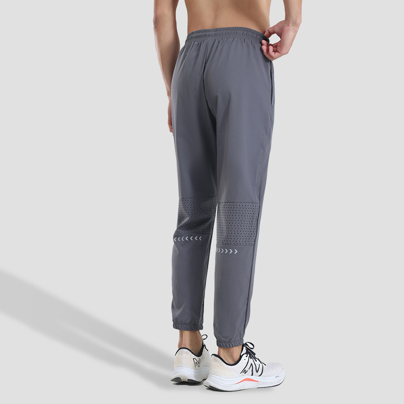 Pantalones deportivos de secado rápido para hombres pantalones casuales de primavera y otoño fitness deportes pista y campo de entrenamiento elástico alto pantalones atados al tobillo