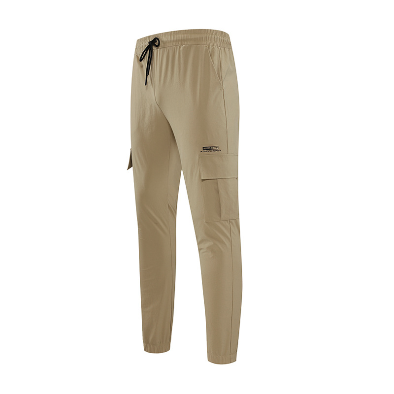 Pantalones de chándal primavera hombres al aire libre Secadores rápidos tejido suelto estiramiento pie fitness Baloncesto Pantalones casual