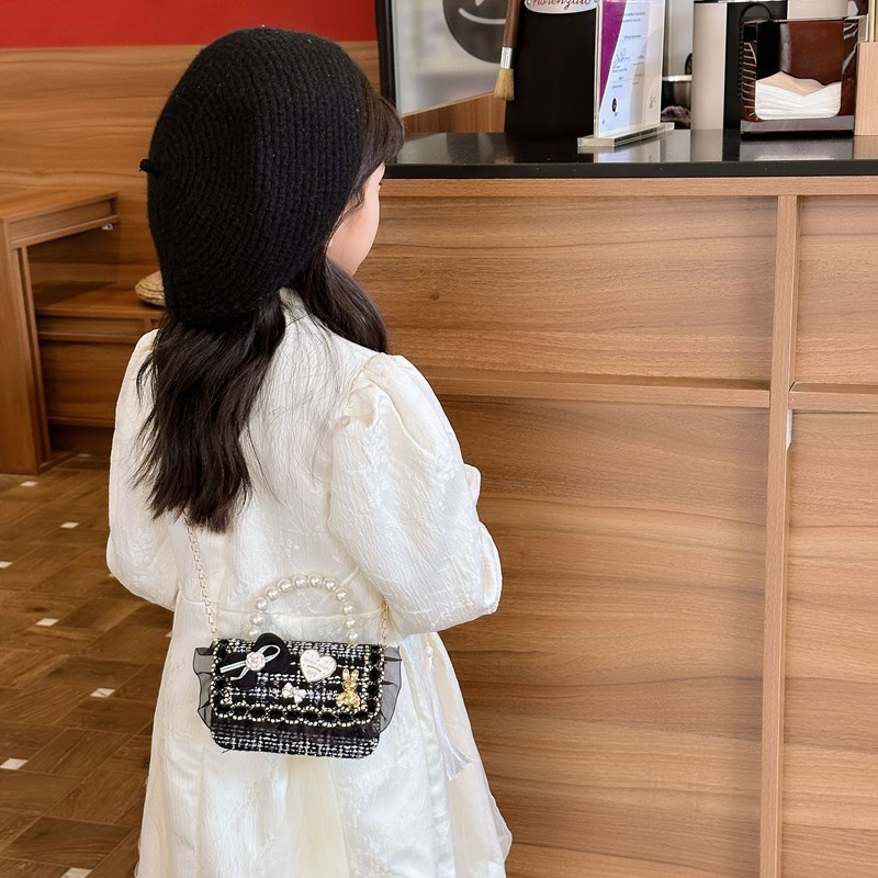 Bolso infantil, lindos arcos de perlas, bolso de mochila para niños, estilo coreano de moda, bolso de hombro para hombres y mujeres.