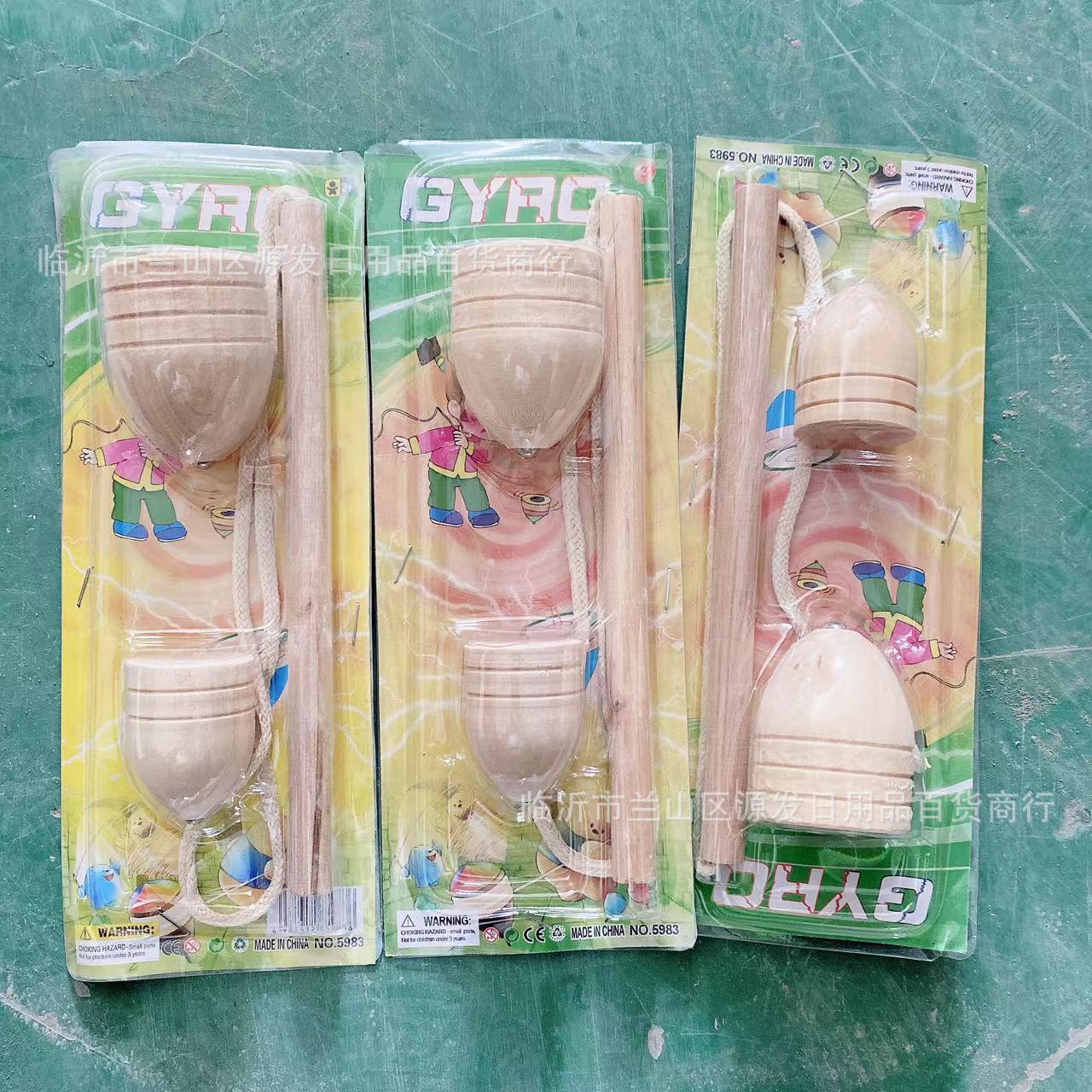 Juego de tarjeta de blister de juguete para niños giroscopio de madera tipo látigo puesto de juguete tradicional nostálgico al por mayor 2 yuanes grandes almacenes